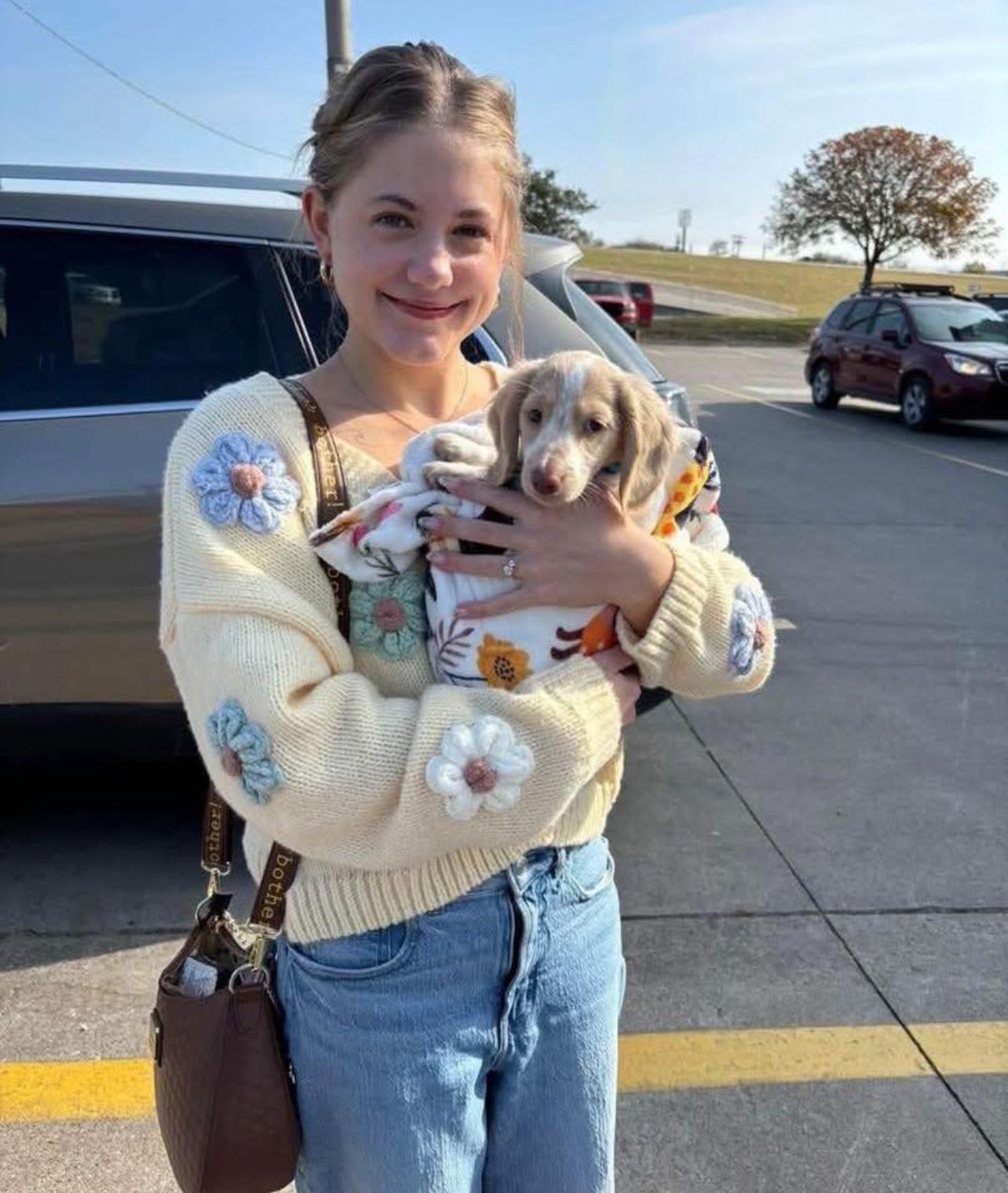Olivia Bennett with their River Stone Doxies Dachshund